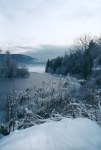Vintersl�r over Tyrivann. Sett fra brua.
Winter veil over Lake Tyri. Seen from the bridge.